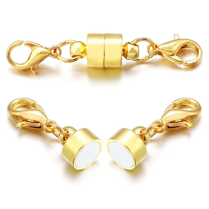 Gold clasp with white stones on a white background
