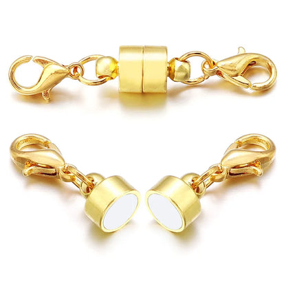 Gold clasp with white stones on a white background