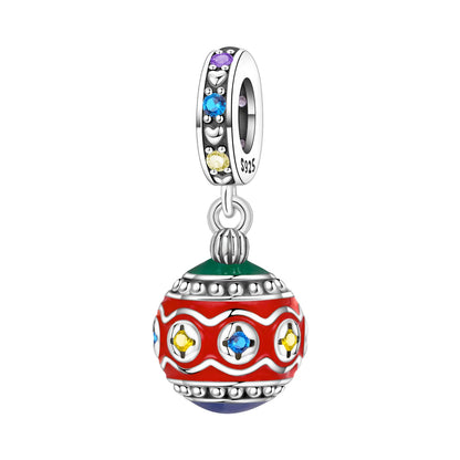 A sterling silver dangle charm featuring a colorful, decorative spherical ornament with red, green, blue, yellow, and purple details, suspended from a silver ring with small colored stones.