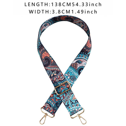 Patterned strap with gold hardware on a white background
