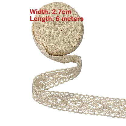 Roll of beige lace ribbon with measurements on a white 
background