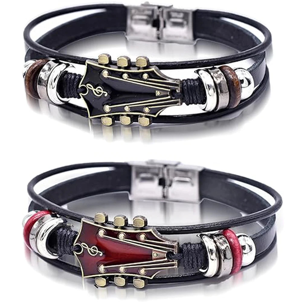 Two guitar-themed leather bracelets with metal accents on a white background