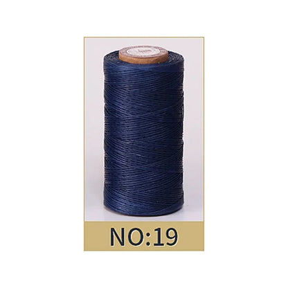 A spool of dark navy blue thread or cord on a light background, with a beige label at the bottom reading 'NO:19'.