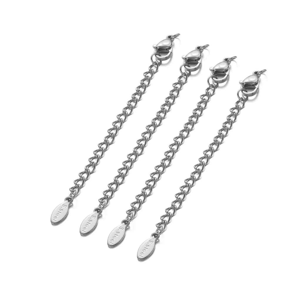 Set of silver chain earrings on a white background