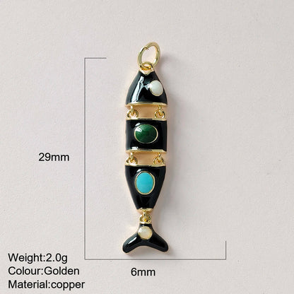 Jewelry pendant with green and blue stones on a light gray background
