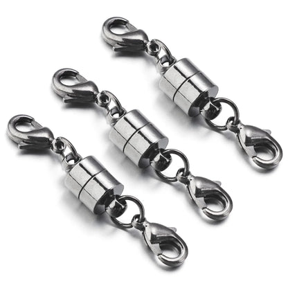 Two metallic clasp connectors with swivel clips on a white background