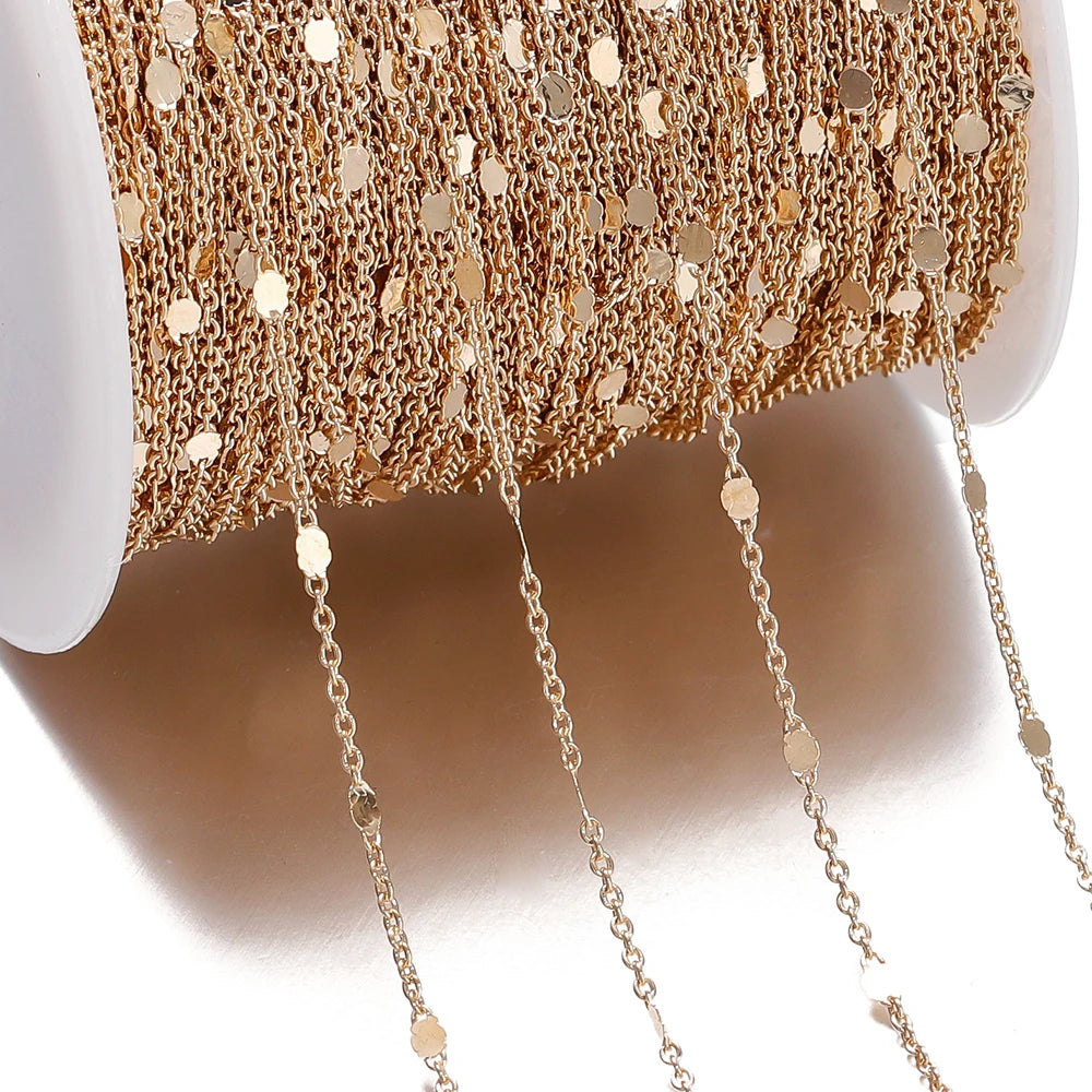 Gold chain necklace on a mannequin with a plain background