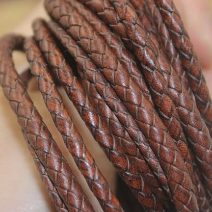 Close-up of braided brown leather cord