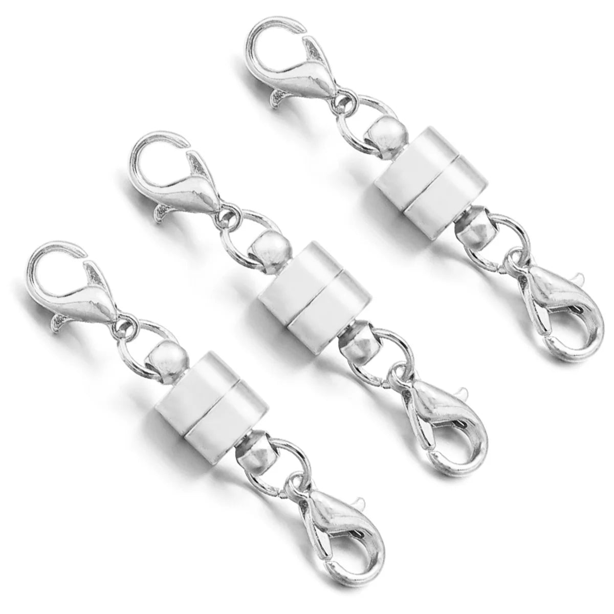 Three silver lobster clasp connectors on a white background