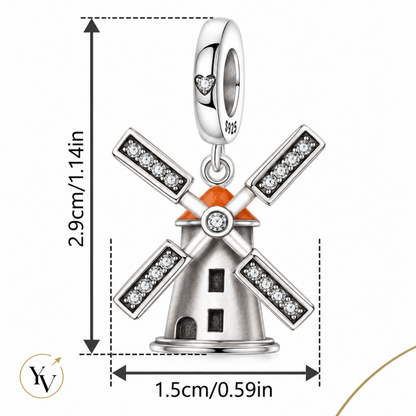 Silver windmill charm pendant with clear crystal accents and orange roof details, shown with dimension lines indicating 2.9cm height and 1.